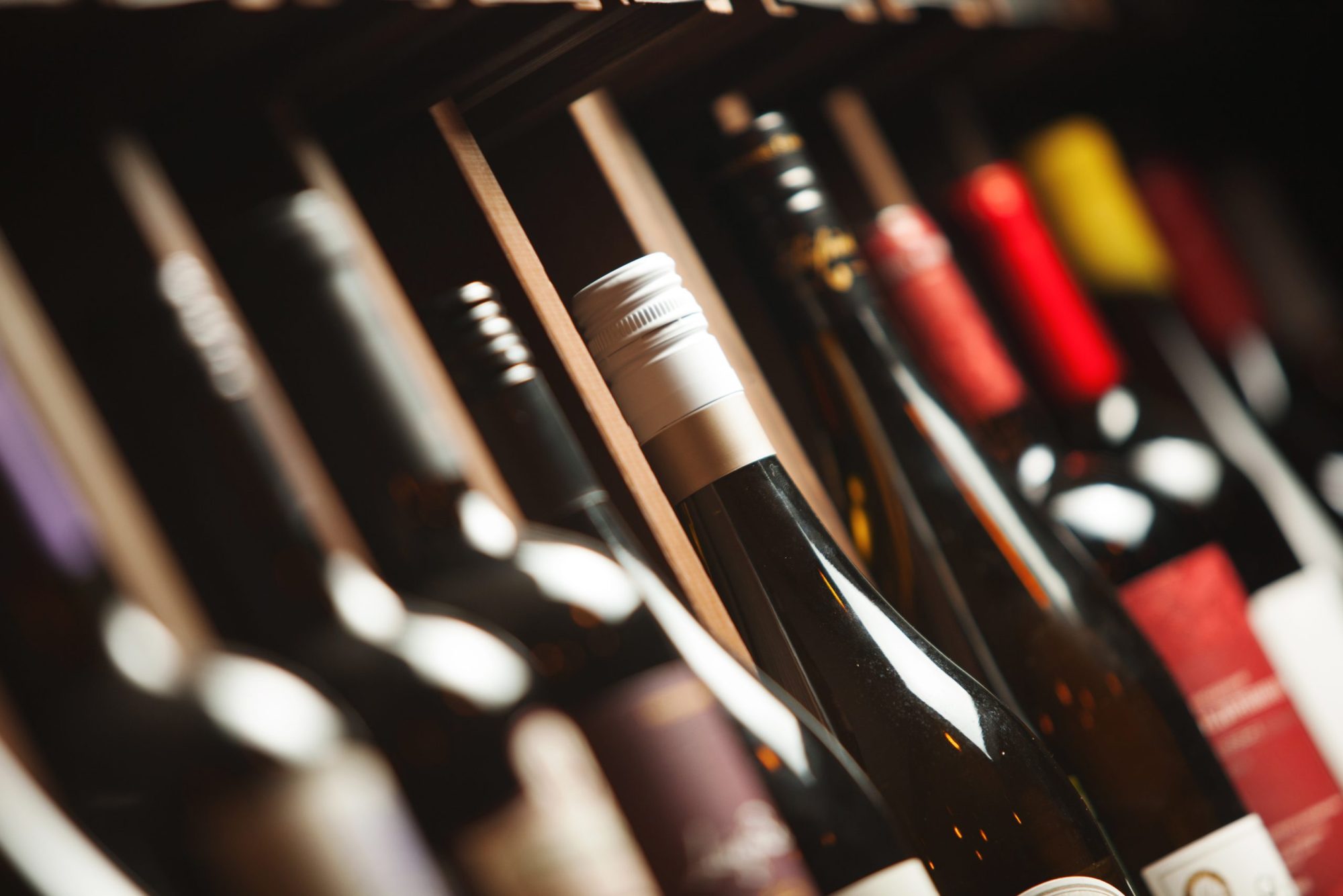 Le V Restaurant Patong Seaview French Restaurant in Patong, Phuket 83150 Thailand Wine Cellar With Elite Drinks Shelves With Written Names Scaled