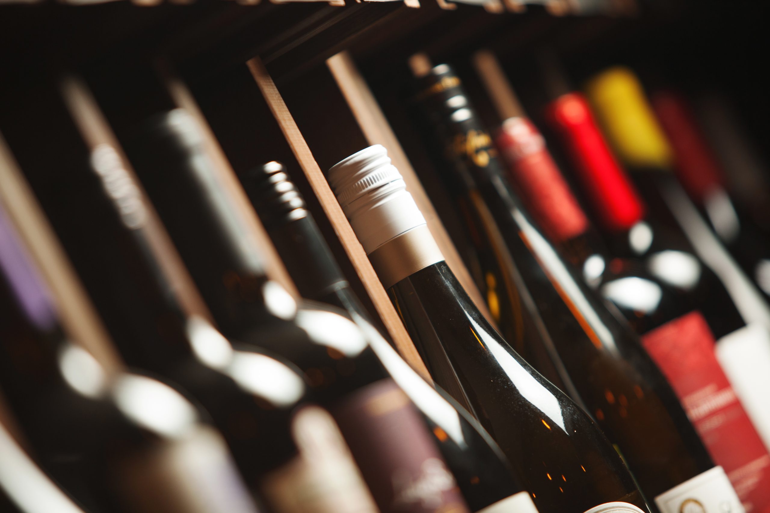 Le V Restaurant Patong Seaview French Restaurant in Patong, Phuket 83150 Thailand Wine Cellar With Elite Drinks Shelves With Written Names Scaled
